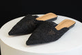 Mule noire en dentelle florale